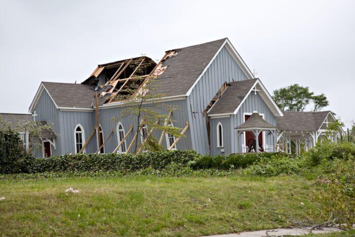 Damaged church, draws attention to the importance of insurance and likelihood of damage from unforeseen circumstances.